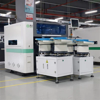 TV caurspīdīga objektīva izvēles un novietošanas mašīna